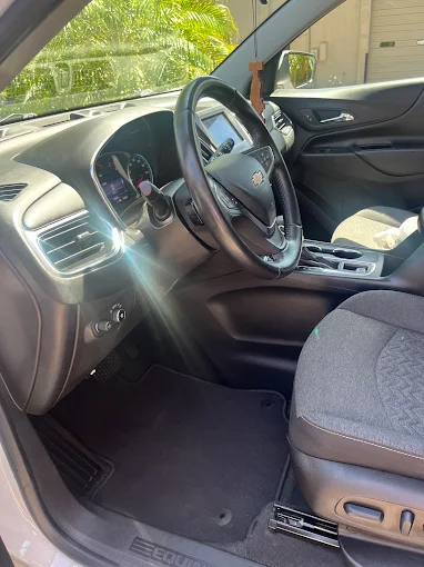 Clean Chevrolet Equinox interior and dashboard at Images Auto Spa Altamonte Springs