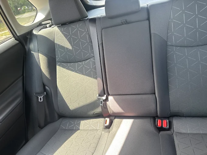 Detailed rear cabin seats after interior cleaning at Images Auto Spa Altamonte Springs