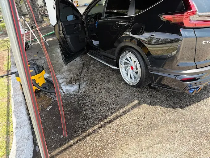 Black Honda CR-V hand wash at AJS Auto Spa
