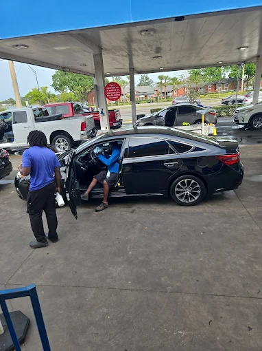 Black sedan interior detailing service at Sparkling Image Car Wash