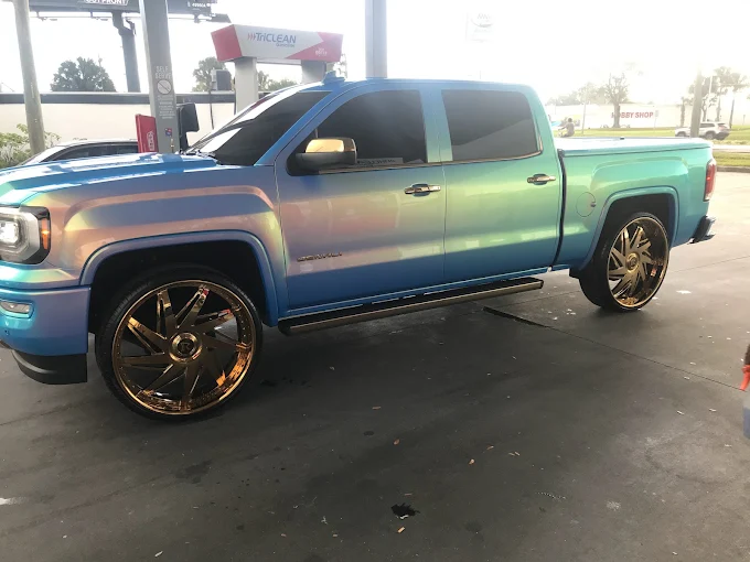 Blue GMC truck detailed at The Car Wash Hand Wash And Detail Center
