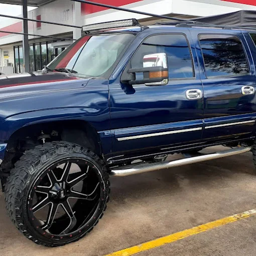 Blue lifted Chevy Tahoe truck detailed at The Car Wash in Orlando