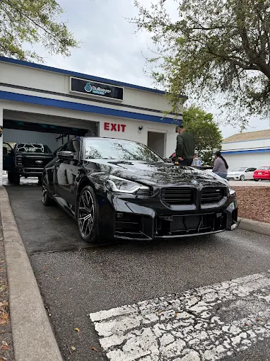 Black BMW after hand wash at Bullseye Auto Spa in Orlando