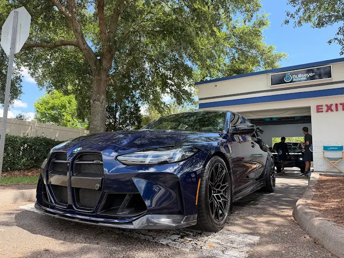 Blue BMW at Bullseye Auto Spa wash exit