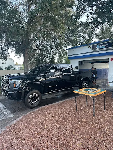 Black GMC Denali truck at Bullseye Auto Spa in Orlando