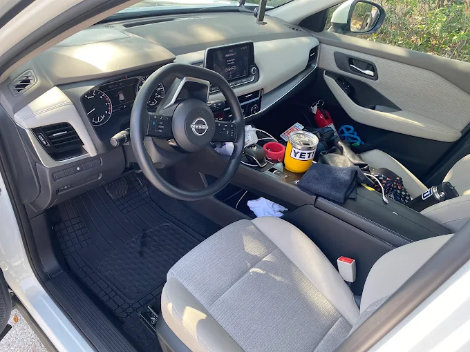 Clean Nissan interior after detailing at DLuxe Hand Car Wash
