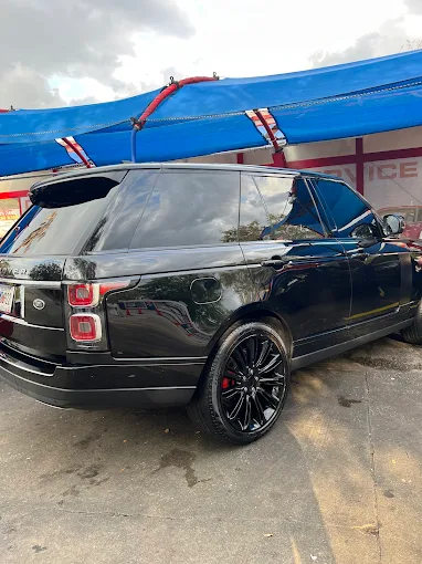 Black Range Rover SUV after hand wash at DLuxe Hand Car Wash