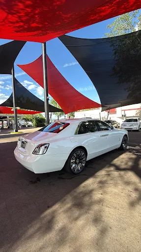 White luxury sedan after wash at Images Auto Spa