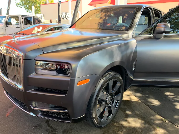 Matte gray Rolls-Royce close-up at Images Auto Spa