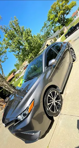 Gray sedan parked at Images Auto Spa in Orlando