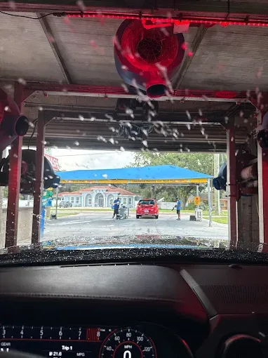 View from inside vehicle during Octopus Car Wash Plant City tunnel wash