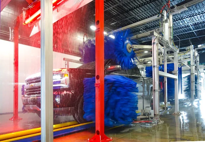 Truck inside Octopus Car Wash Plant City automatic wash tunnel
