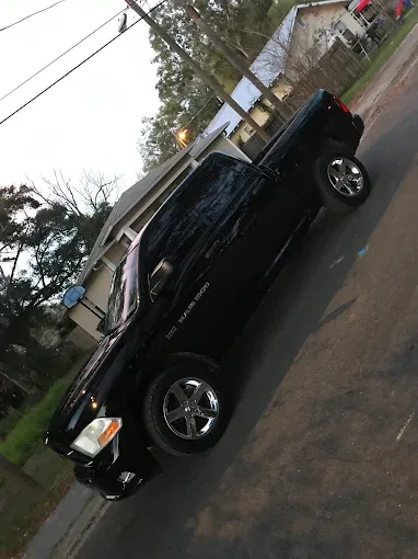 Black pickup truck after car wash service in Plant City