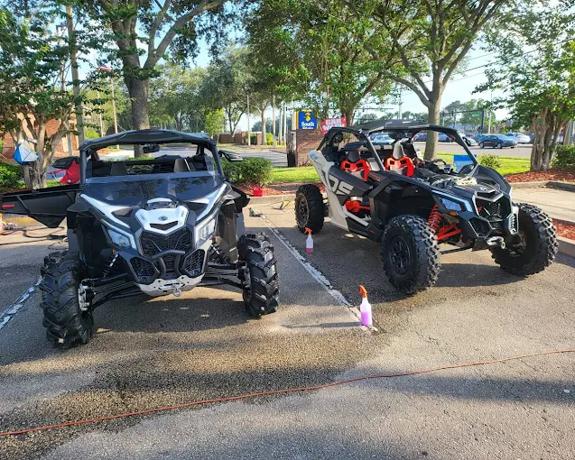 Off-road vehicles cleaned by hand at detailing service