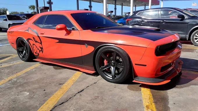 Orange Dodge Challenger SRT detailed at The Car Wash in Orlando
