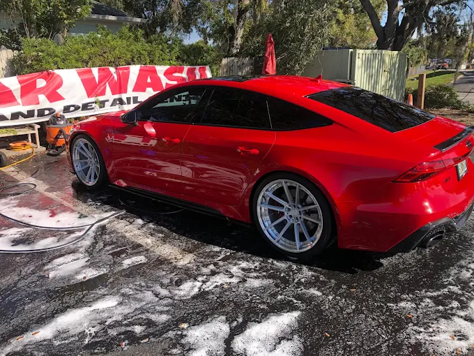 Red Audi after detail service at Orlando hand wash center