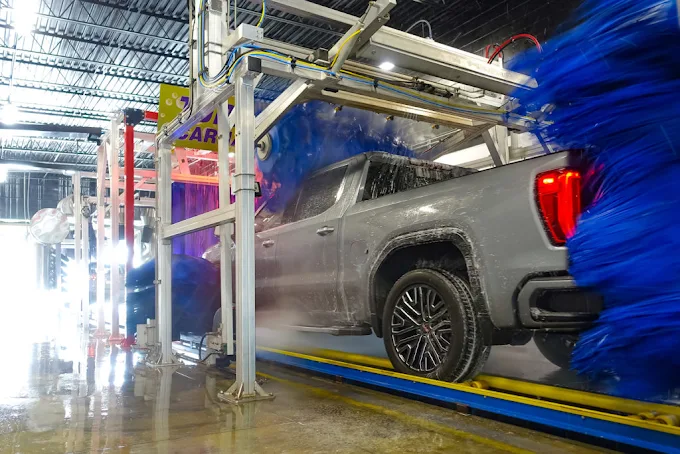 Truck going through Octopus Car Wash tunnel in Orlando