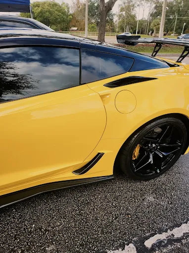 Yellow Corvette side profile after detailing